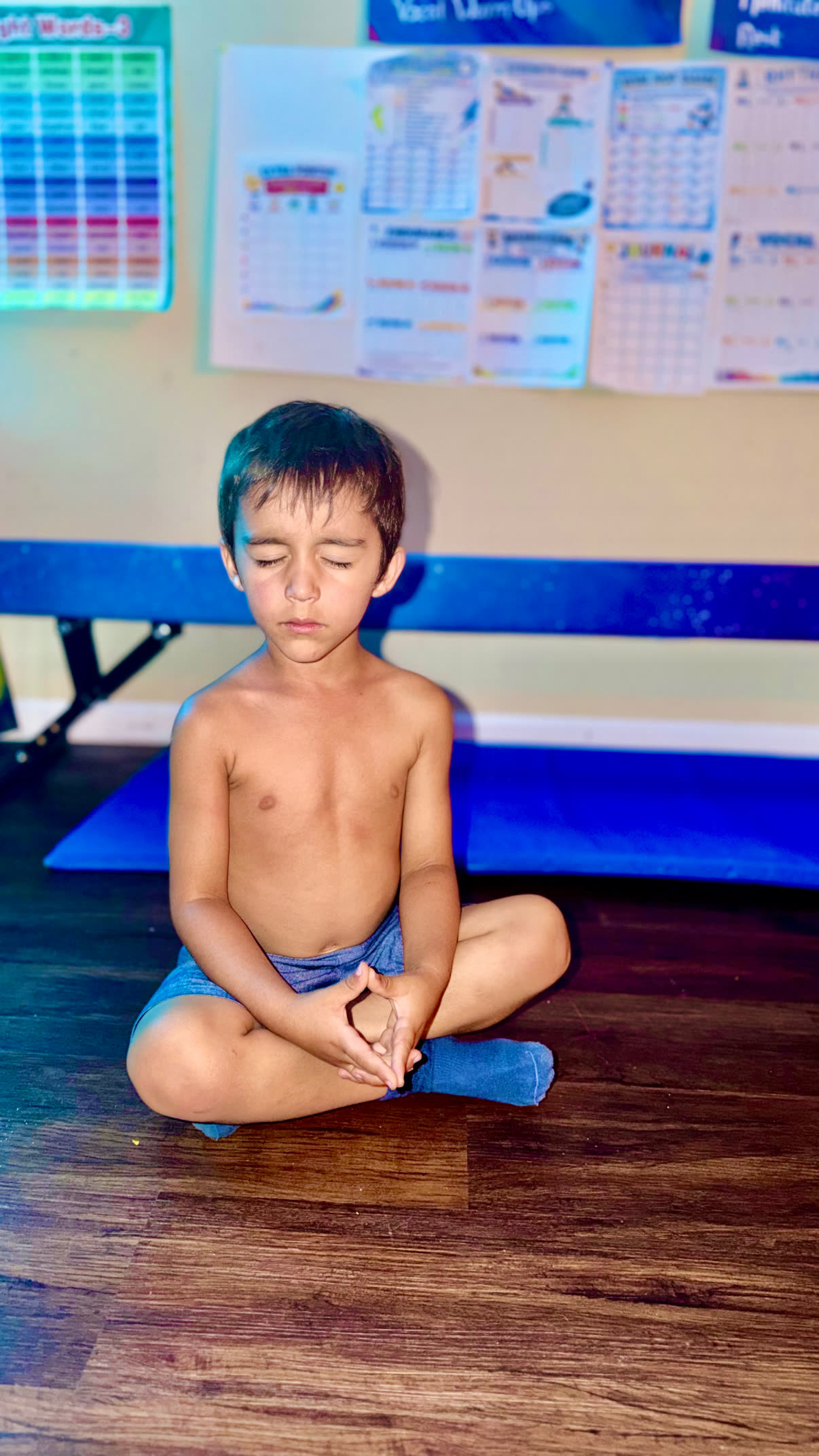A child practicing stillness and breath