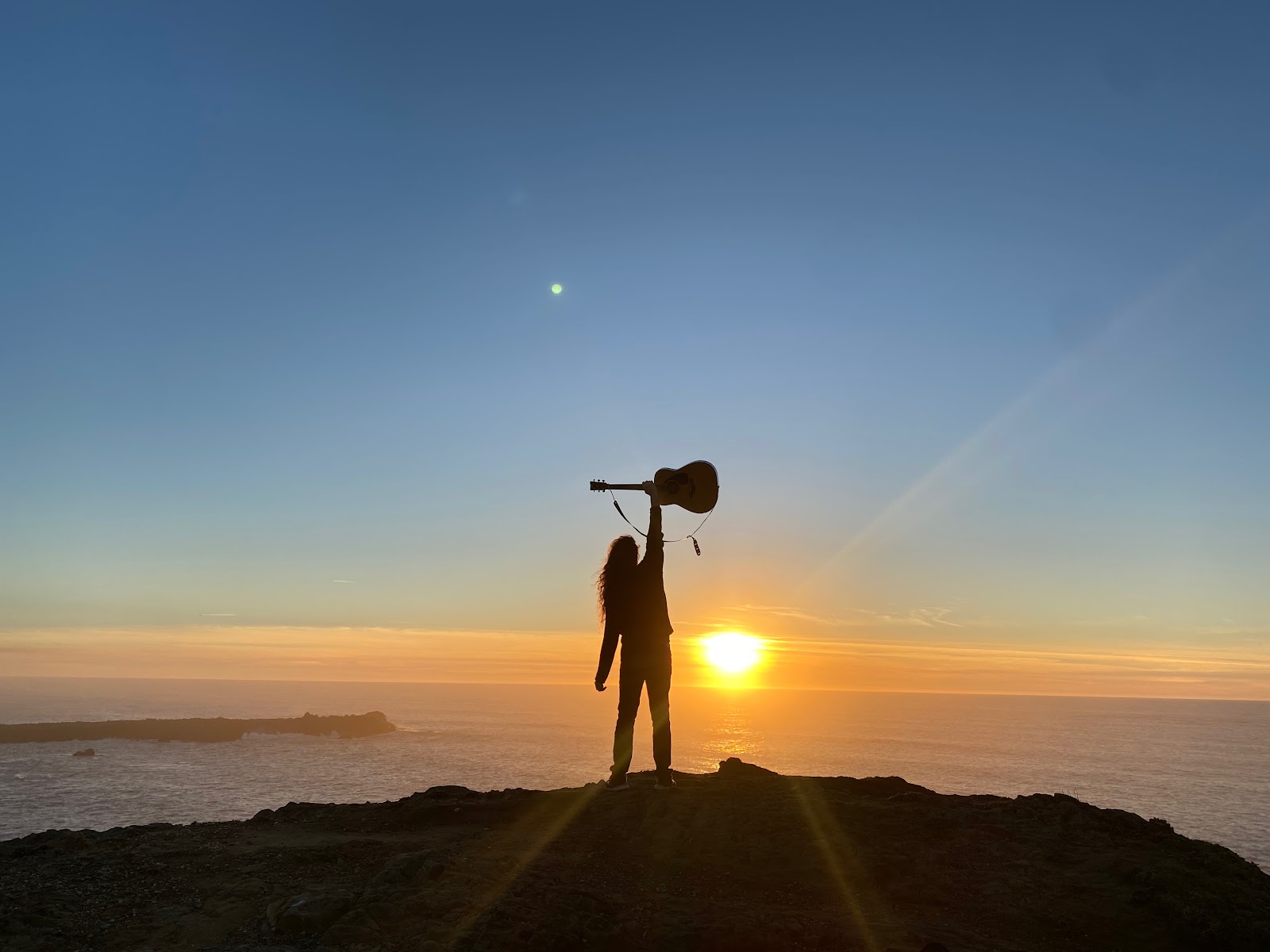 Stargazing at sunset through a telescope
