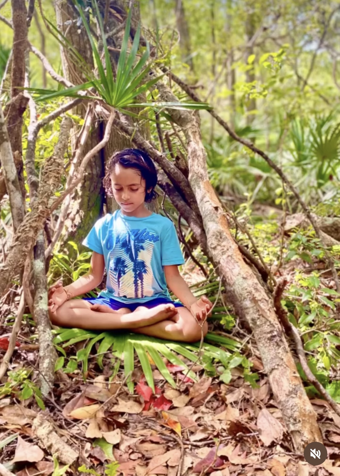 A child meditating in nature