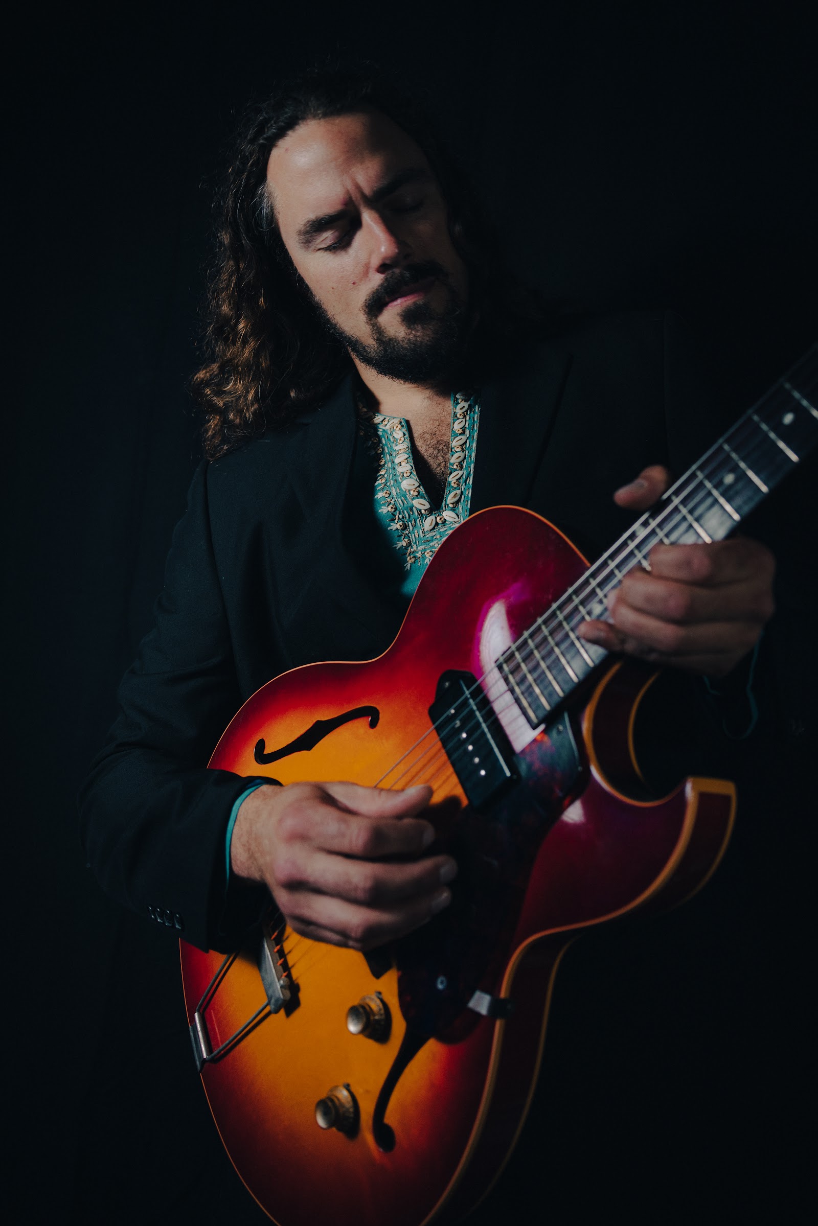 Garret Rhea playing guitar